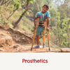 A little boy smiling with crutches and a prosthetics with the captions ' prosthetics'